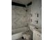 Bathroom featuring tiled shower, tub, toilet, and vanity with modern fixtures at 6308 Stanwin Dr, Apopka, FL 32712