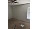 A bedroom with neutral carpet, fan, and window with blinds at 6308 Stanwin Dr, Apopka, FL 32712