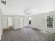 Neutral bedroom with carpet flooring, natural light, and access to the en-suite bath at 6740 Odoniel W Loop, Lakeland, FL 33809
