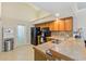 Well-equipped kitchen with modern appliances, granite countertops, and ample cabinet space at 7263 Spring Villas Cir, Orlando, FL 32819