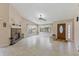 Bright living room featuring a fireplace, tile floors, and abundant natural light at 7263 Spring Villas Cir, Orlando, FL 32819