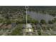 A neighborhood with a waterfront view and an outlined single Gathering house for sale at 7809 Altavan Ave, Orlando, FL 32822