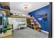 Unique themed bedroom with loft bed, study area, and custom lighting at 7809 Altavan Ave, Orlando, FL 32822