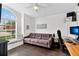 Cozy bedroom features a built-in window seat and ample natural light at 7809 Altavan Ave, Orlando, FL 32822