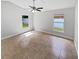 Bedroom featuring tile flooring, a ceiling fan, and natural light from the window at 8994 Fort Jefferson Blvd, Orlando, FL 32822