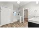 Well-lit bathroom showcasing wood-look tile, a shower, and a modern vanity at 917 Southern Oak Ln, Apopka, FL 32712