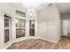 Breakfast nook featuring large windows with a view of the pool and wood-look tile flooring at 917 Southern Oak Ln, Apopka, FL 32712