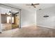 Living room featuring light tile floors, sliding glass doors, and a ceiling fan at 917 Southern Oak Ln, Apopka, FL 32712