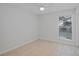Bedroom with ceramic tile floors, ceiling fan, and natural light from one window at 1026 Mccully Ct, Oviedo, FL 32765
