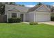 Inviting single-Gathering home with a neatly kept lawn and a convenient two-car garage at 1026 Mccully Ct, Oviedo, FL 32765
