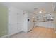 Spacious kitchen with white appliances, ample storage, and open access to dining and living areas at 1026 Mccully Ct, Oviedo, FL 32765
