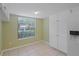 Cozy kitchen nook featuring a window and white cabinetry, perfect for casual dining at 1026 Mccully Ct, Oviedo, FL 32765