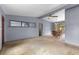 Spacious living room with a ceiling fan and an adjacent dining area with a wooden table set at 110 N Sunland Dr, Sanford, FL 32773