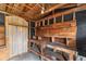 Interior view of a shed with open wooden framework and workbench area at 110 N Sunland Dr, Sanford, FL 32773