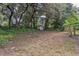 Spacious backyard with lots of mature trees at 1212 N Hudson St, Orlando, FL 32808