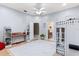 Spacious bedroom with bunk beds, piano, ceiling fan, and access to bathroom at 1224 Northern Way, Winter Springs, FL 32708