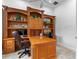 Office area with a custom built-in desk and shelving at 1224 Northern Way, Winter Springs, FL 32708