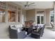 The outdoor patio features comfortable seating, a grill, and an outdoor kitchen at 1224 Northern Way, Winter Springs, FL 32708
