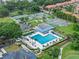 A high angle captures the pool, tennis courts, and surrounding landscapes at 1224 Northern Way, Winter Springs, FL 32708
