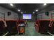 Home theater with comfortable seating and large screen for entertainment at 1224 Northern Way, Winter Springs, FL 32708