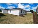 This home features a spacious backyard at 1323 Wood Line Dr, Deland, FL 32720