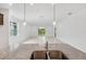 Contemporary kitchen features granite countertops, stainless steel sink, and stylish lighting at 1323 Wood Line Dr, Deland, FL 32720