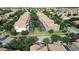 Expansive aerial view of a neighborhood featuring tiled roofs and screened-in pools at 1452 Moon Valley Dr, Davenport, FL 33896
