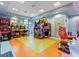 Arcade room with lots of machines to play at this community clubhouse at 1452 Moon Valley Dr, Davenport, FL 33896