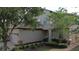Charming two-story home with well-maintained landscaping and a two-car garage at 1452 Moon Valley Dr, Davenport, FL 33896