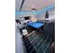 Spacious game room with a pool table, foosball, ping pong, and custom lighting at 1452 Moon Valley Dr, Davenport, FL 33896