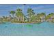 Enjoy floating down the community's lazy river, surrounded by lush landscaping and beautiful Florida weather at 1452 Moon Valley Dr, Davenport, FL 33896