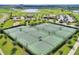 Aerial view of the community's six well-maintained tennis courts at 1452 Moon Valley Dr, Davenport, FL 33896