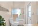 Bathroom featuring a toilet, a shower with glass doors, and a towel rack at 14634 Astina Way, Orlando, FL 32837
