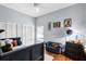 Bedroom with hardwood floors, closet, and natural light from the window at 14634 Astina Way, Orlando, FL 32837