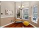 Charming breakfast nook bathed in light, perfect for a cozy dining experience at 14634 Astina Way, Orlando, FL 32837