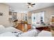 Spacious living room with hardwood floors, ample seating, and an open-concept design at 14634 Astina Way, Orlando, FL 32837