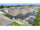 Aerial view of a home with a screened pool and patio area in a residential neighborhood at 1556 Alligator St, St Cloud, FL 34771
