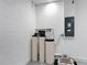 Utility room featuring water filtration system and electrical panel, ensuring home maintenance at 1556 Alligator St, St Cloud, FL 34771