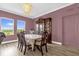 A beautiful dining room with a large window and a chandelier at 1797 Sundance Chase Rd, Minneola, FL 34715
