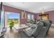 A spacious living room with a marble table and plush seating for relaxing at 1797 Sundance Chase Rd, Minneola, FL 34715