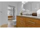Bright bathroom with a vanity and a glimpse of a soaking tub and shower creating a spa-like experience at 1945 Bering Ave, Winter Park, FL 32789