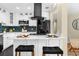 Bright kitchen with modern appliances, white cabinets, sleek countertops, and a convenient island at 1945 Bering Ave, Winter Park, FL 32789