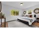 Inviting main bedroom showcasing windows and a comfortable bed with stylish accents for a relaxing retreat at 1945 Bering Ave, Winter Park, FL 32789