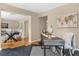 Inviting entryway featuring a stylish office area and a glimpse into the dining room, blending functionality with design at 1945 Bering Ave, Winter Park, FL 32789