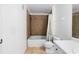 Bathroom features a shower and tub, modern vanity and neutral tile flooring at 1950 Summer Club Dr # 200, Oviedo, FL 32765