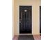 Unit 200 featuring a black, classic style front door at 1950 Summer Club Dr # 200, Oviedo, FL 32765