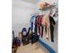 Walk-in closet with clothes rack, storage shelves, black trunk and laminate floor at 1950 Summer Club Dr # 200, Oviedo, FL 32765