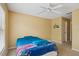 Bright bedroom with wall art and ceiling fan featuring plush carpet and great natural light at 1967 Beacon Bay Ct, Apopka, FL 32712