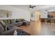 Open-concept living area showcases stylish décor and a breakfast bar with wood accents at 1967 Beacon Bay Ct, Apopka, FL 32712