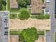 Aerial view showcasing the well-maintained community grounds and ample parking at 200 St Andrews Blvd # 911, Winter Park, FL 32792